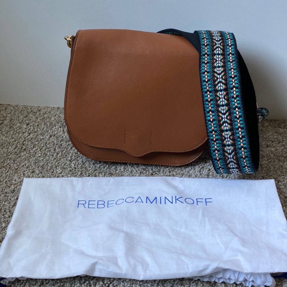Rebecca Minkoff leather saddle bag with guitar strap. Used once.